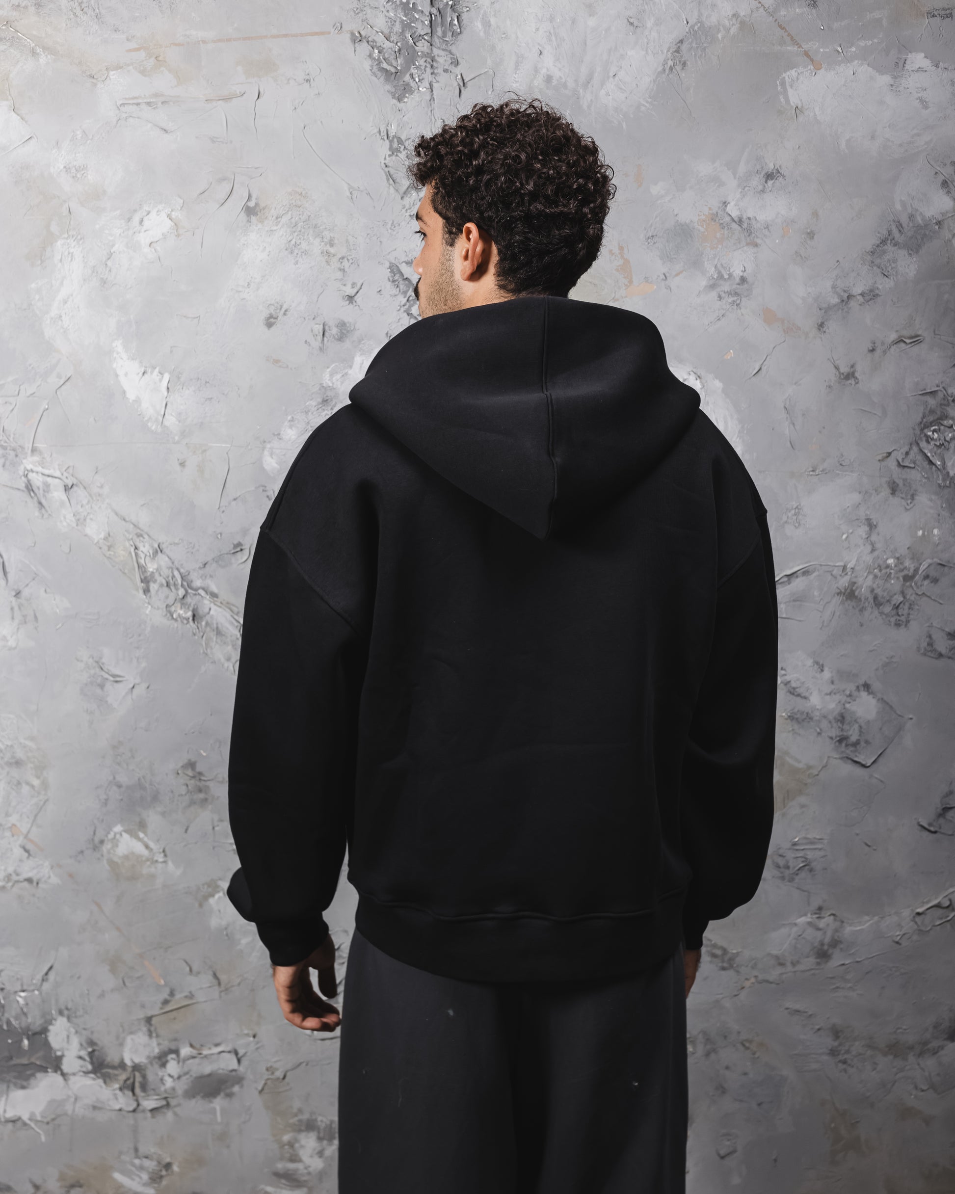 Excentred stitched zipup